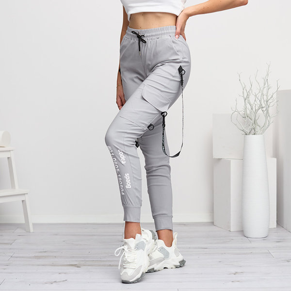 Pilkos moteriškos krovininės kelnės su užrašais - Drabužiai
