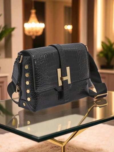 Royalfashion Błyszcząca mała torebeczka Nexa Vale z eko sk
rki