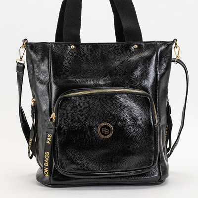 Черная женская большая сумка в золотом цвете