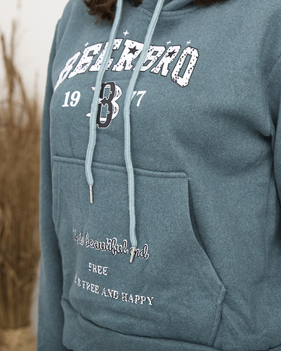 Jūrinės spalvos apšiltintas moteriškas sportinis kostiumas su užrašais - Apranga