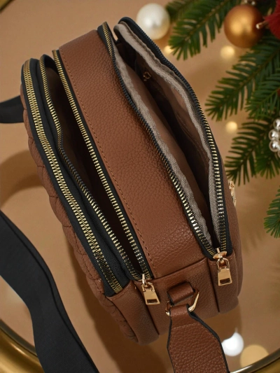 Dygsniuota maža moteriška rankinė iš eko odos Corinne