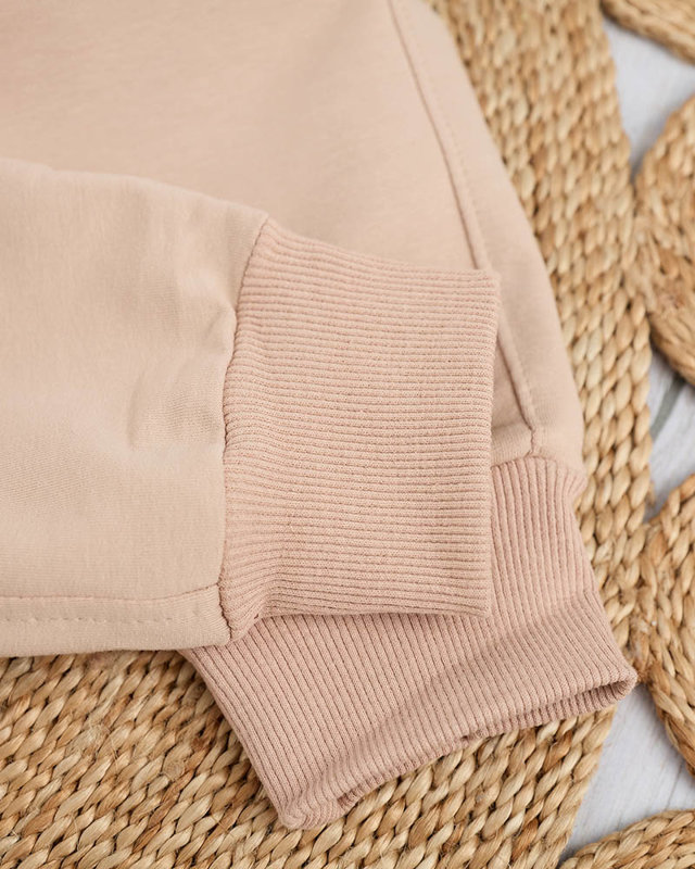 Женские бежевые спортивные штаны с цветной нашивкой - Одежда