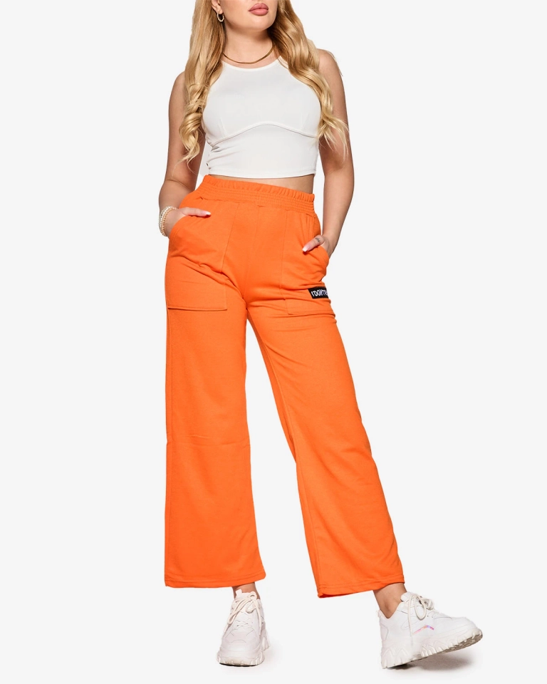 Moteriškos oranžinės plačios sportinės kelnės - Apranga