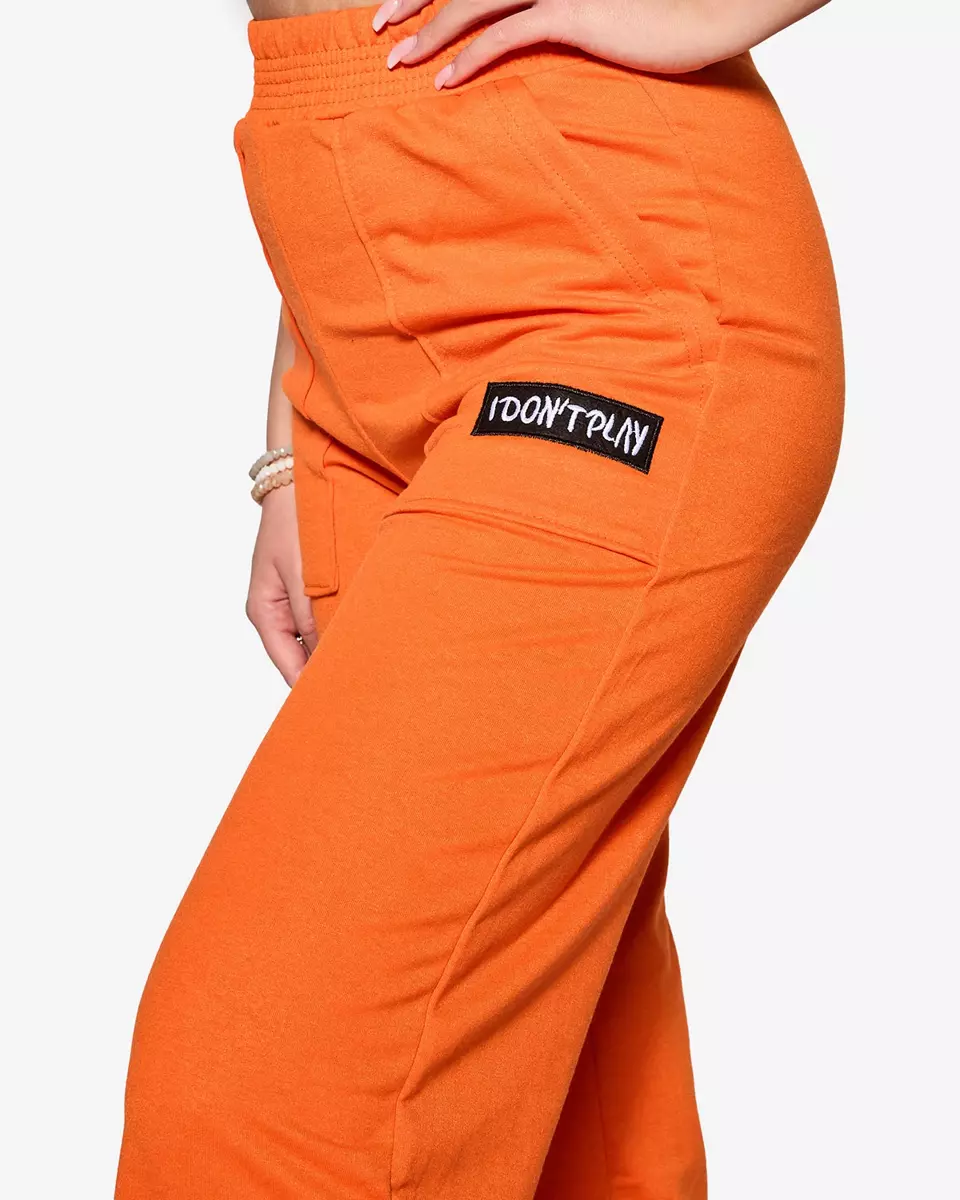 Moteriškos oranžinės plačios sportinės kelnės - Apranga