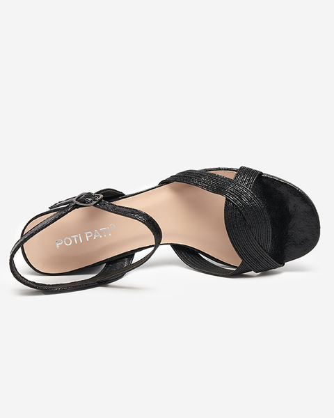 OUTLET Juodi moteriški sandalai ant stulpelio iš Subproduktų- Avalynė