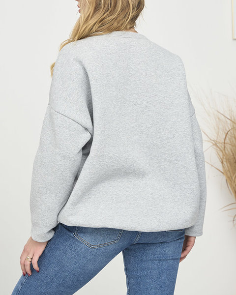 Pilkos spalvos moteriškas džemperis su užrašu- Apranga