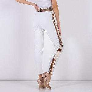 Белые женские брюки с принтом - Одежда