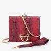 Красная женская сумка со змеиным принтом
